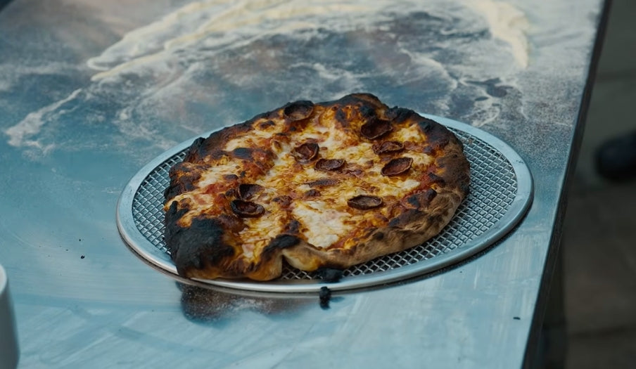 Burnt pizza on a working surface