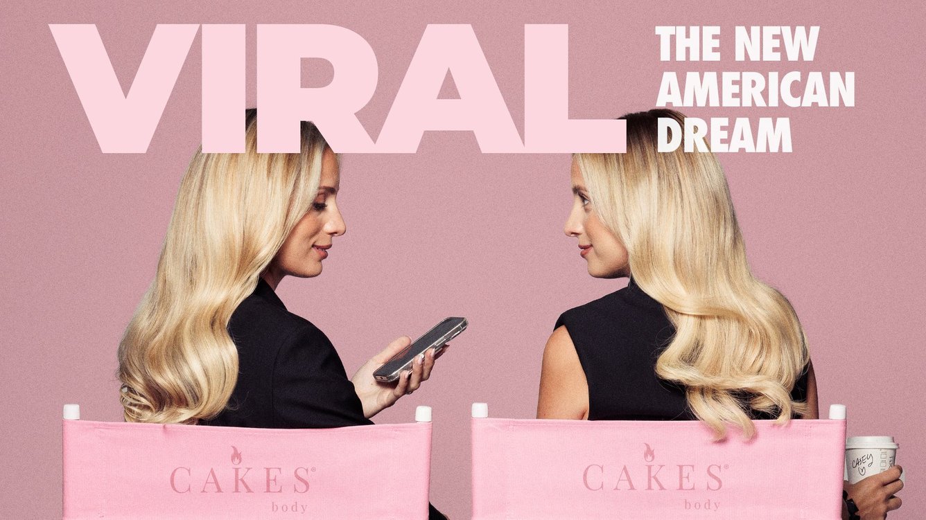 Two twin sisters, Casey Sarai and Taylor Capuano, sit facing each other against a pink background, with the title 