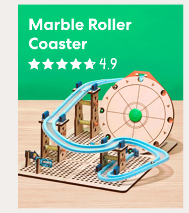 Marble Roller Coaster. Rated 4.9 out of 5 stars. A wooden marble roller coaster with winding blue tracks, ramps, supports, and a large rotating wheel.