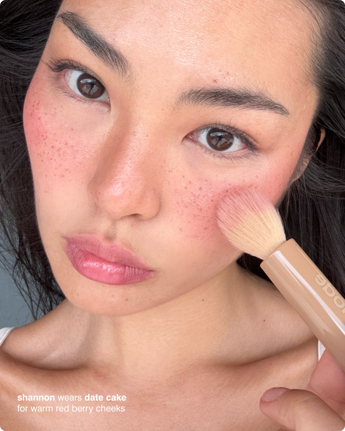 shannon wears date cake for warm red berry cheeks