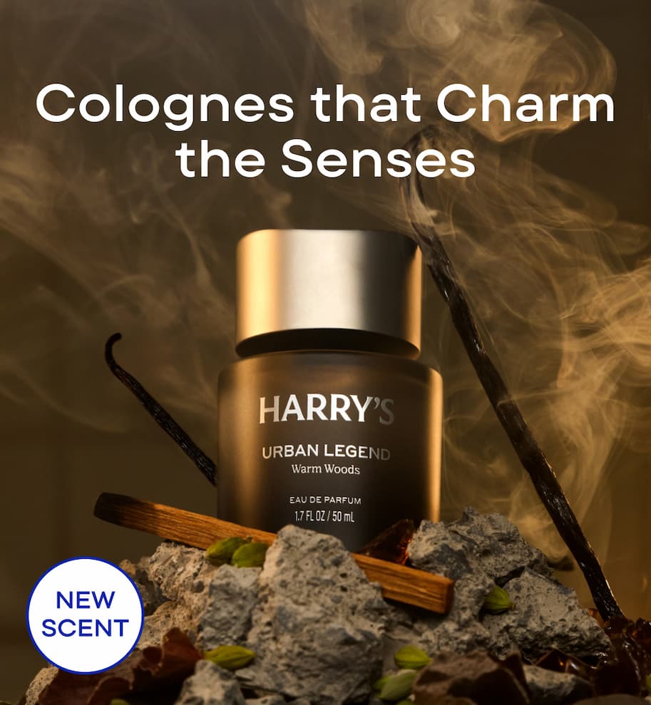 Colognes that Charm the Senses. New scent: Harry's Urban Legend cologne on a mossy, rocky surface.