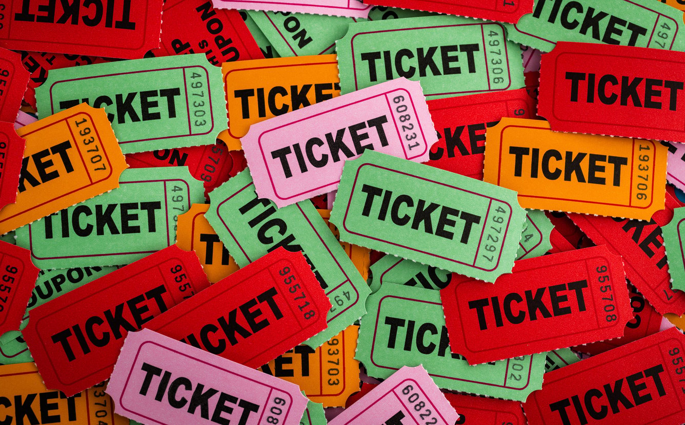 a pile of colorful tickets 