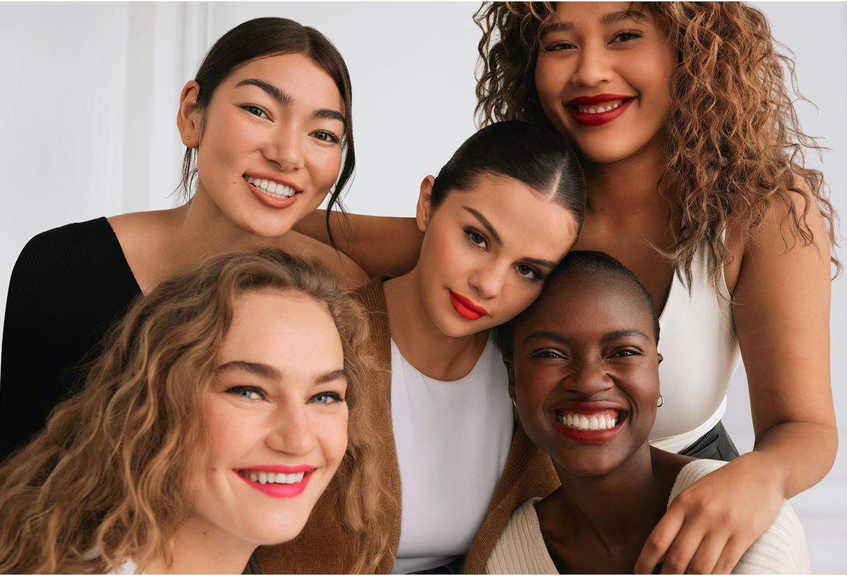 group of women wearing rare beauty 