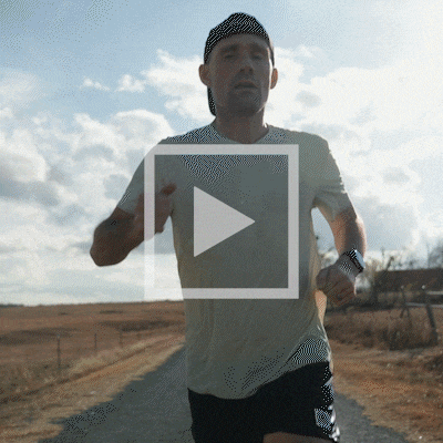 Zach Bitter running and sweating, followed by a shot of him smiling as he speaks to the camera