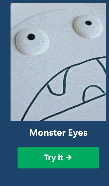 Monster Eyes. A playful monster face with raised green-and-black eyes and drawn teeth. Try it
