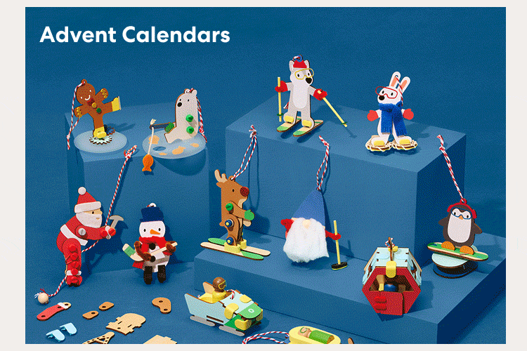 Advent Calendars. A festive collection of colorful winter-themed ornaments features Santa, a snowman, penguins, a skiing reindeer, a snowshoeing rabbit, an ice-fishing bear, and other playful characters