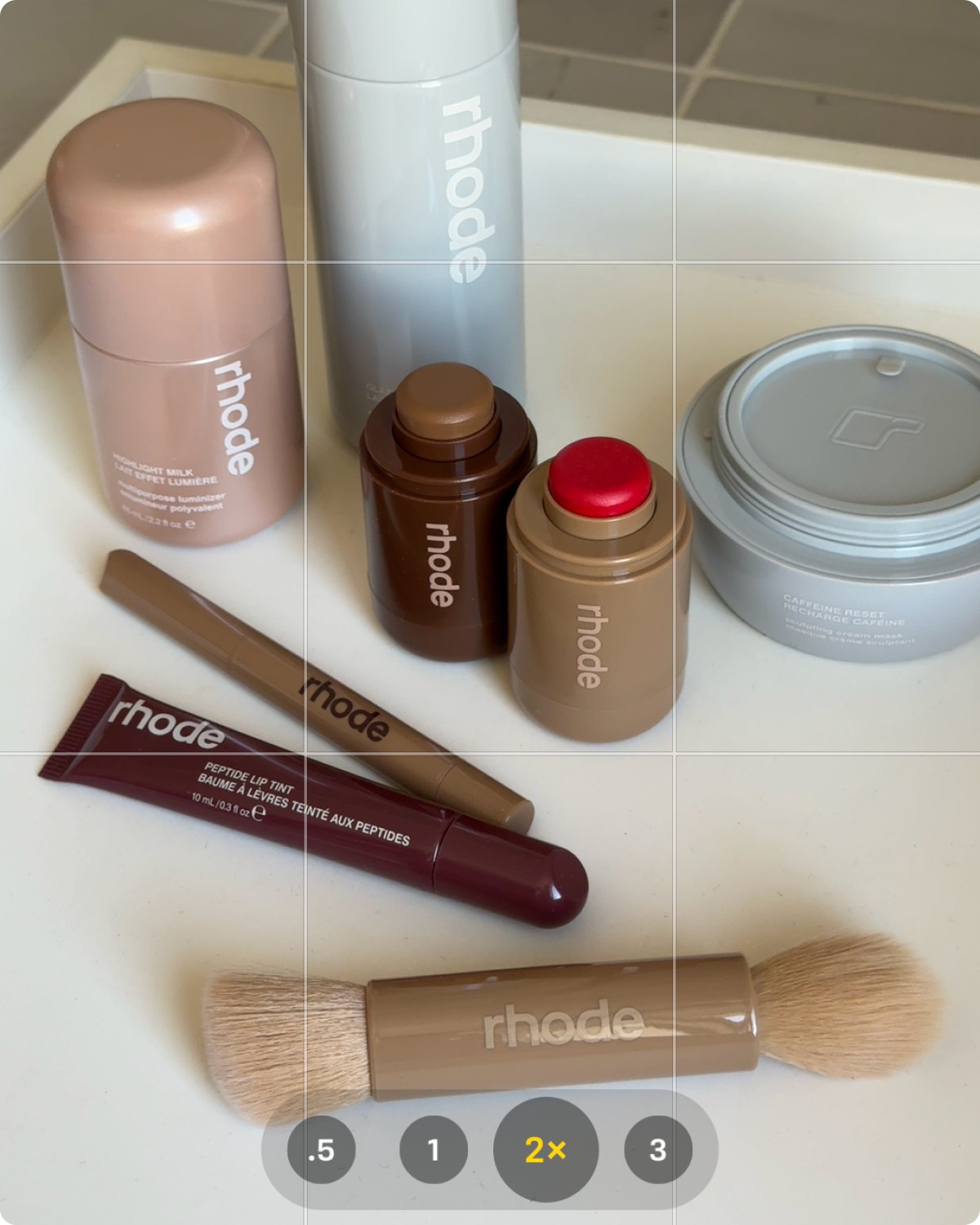 highlight milk in 02, glazing milk, caffeine reset, pocket bronze in sunbed, pocket blush in candy apple, peptide lip shape in balance, peptide lip tint in pbj, and pocket brush