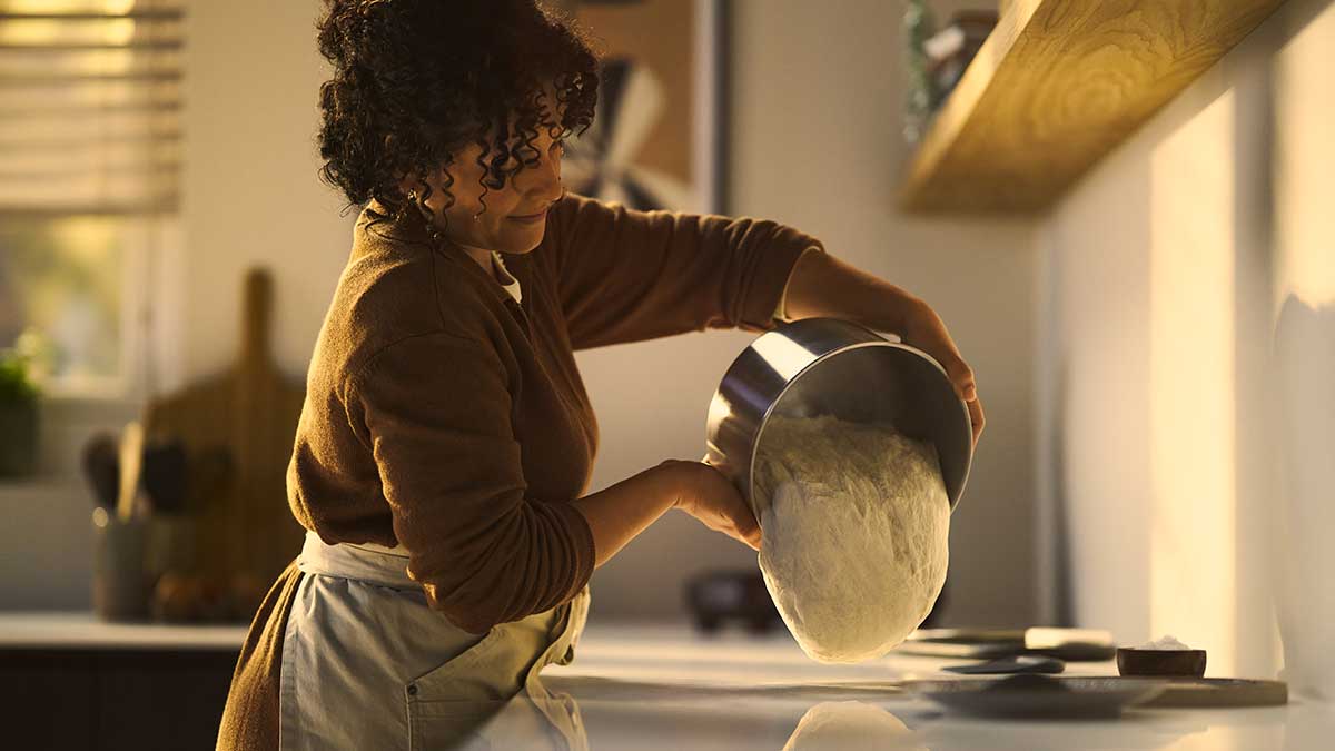 Dough being poured out of Halo Core's removable bowl