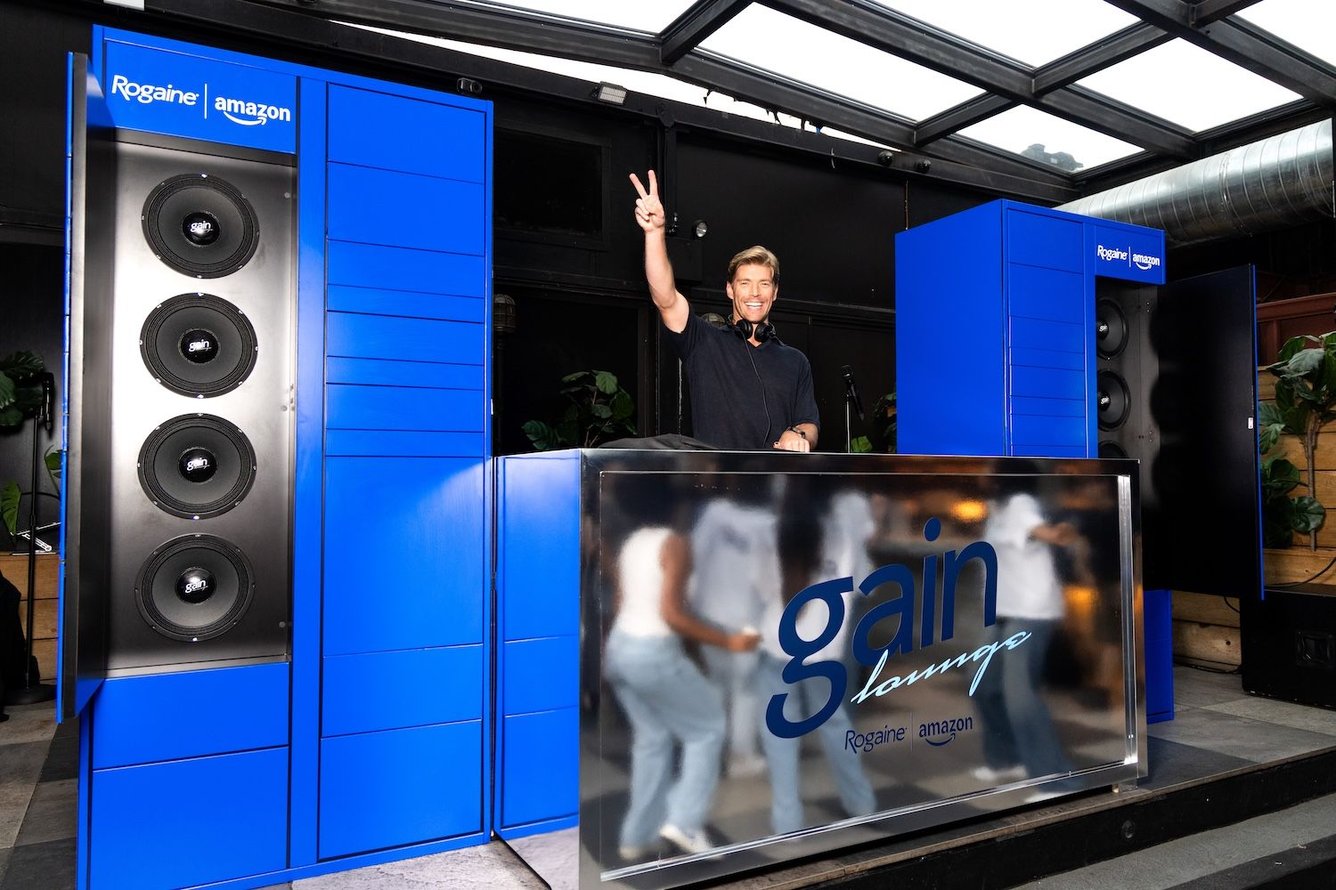 A man DJs at a Rogaine pop-up event.