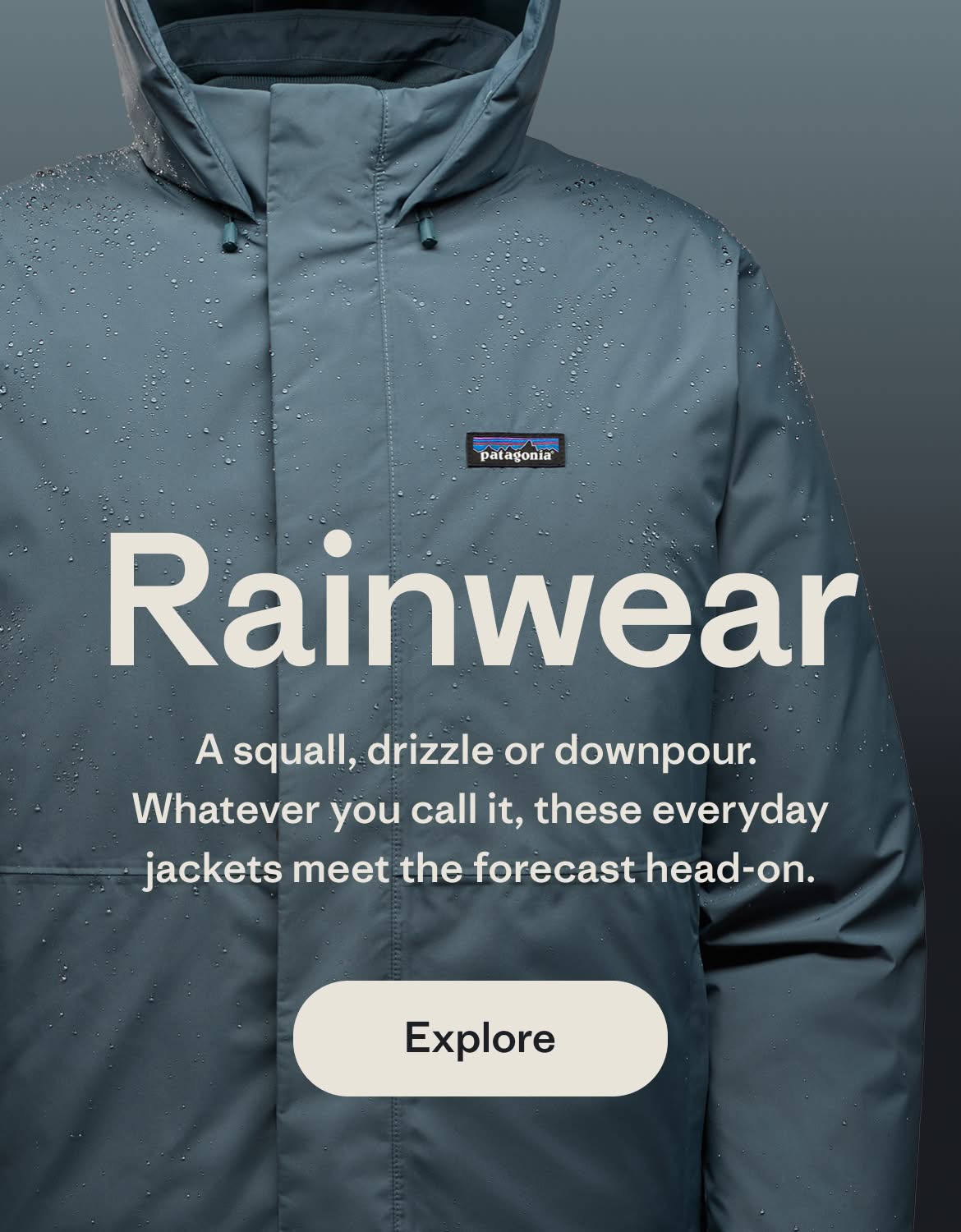 Rainwear. A studio shot of a hooded rain jacket with water drops beading up on the fabric.