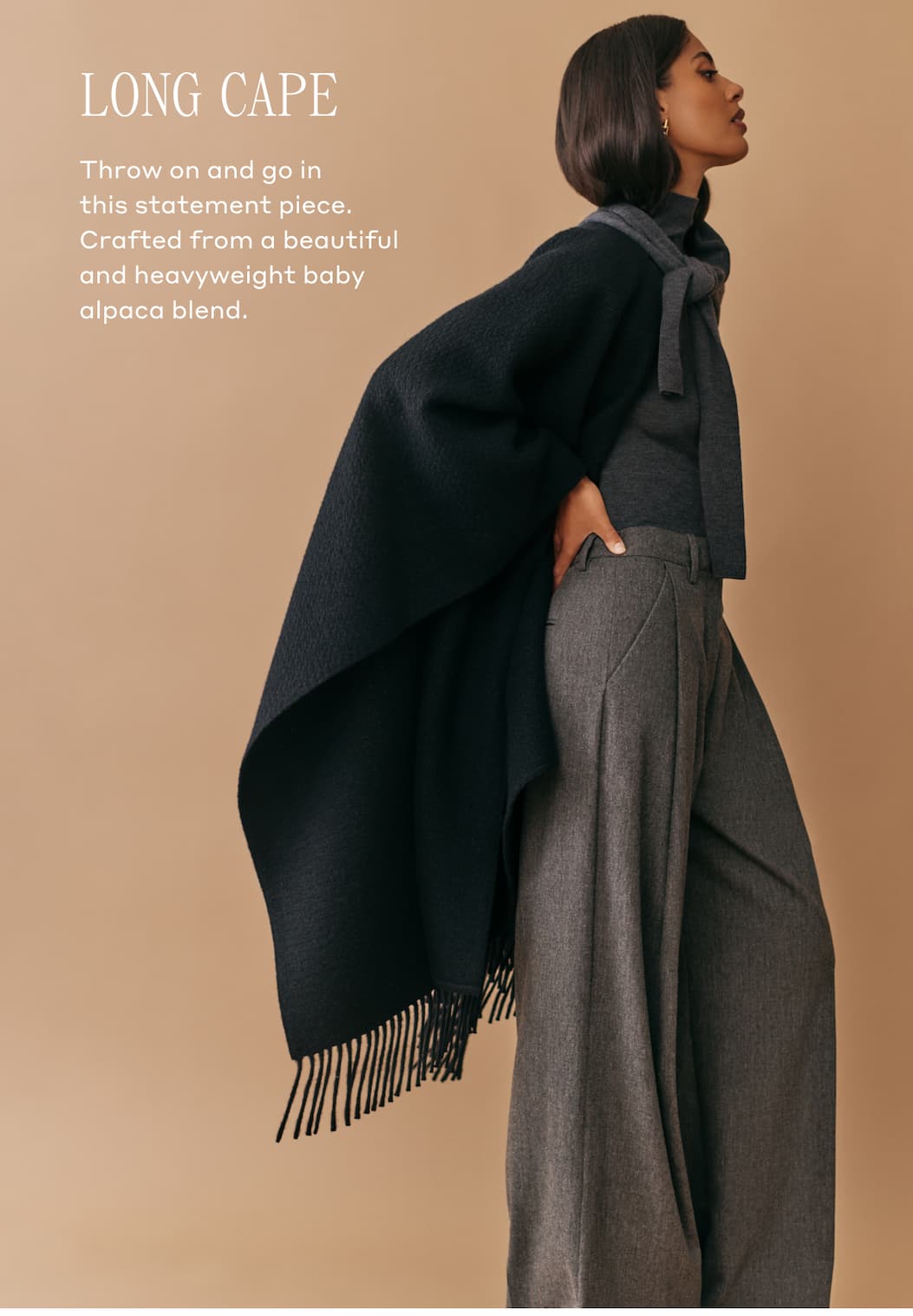 LONG CAPE Throw on and go in this statement piece. Crafted from a beautiful and heavyweight baby alpaca blend.