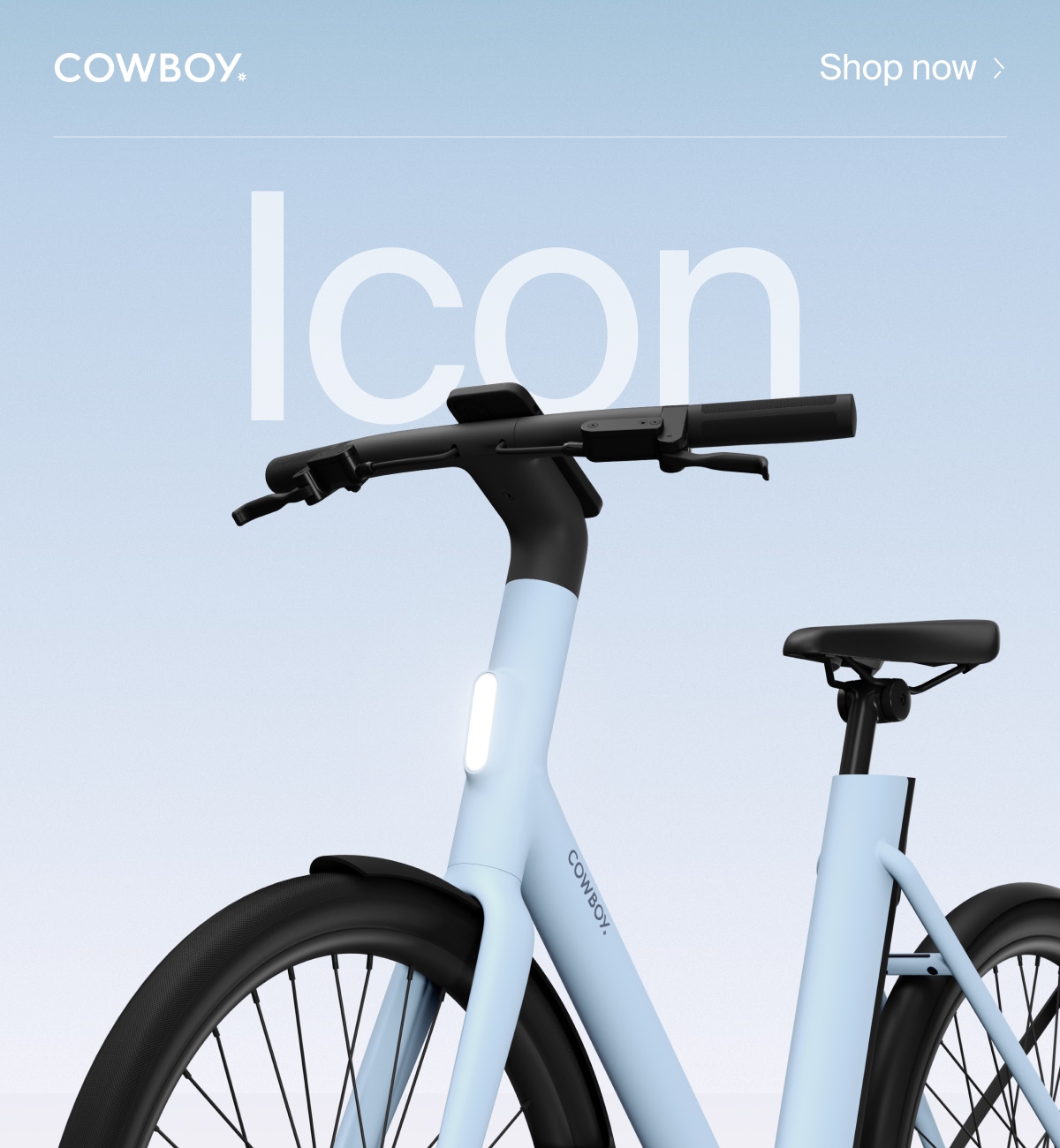 A Cowboy e-bike in the Breeze colorway, a soft blue frame with black accents, shown from a low angle against a gradient background with the word &ldquo;Breeze&rdquo; in large text.