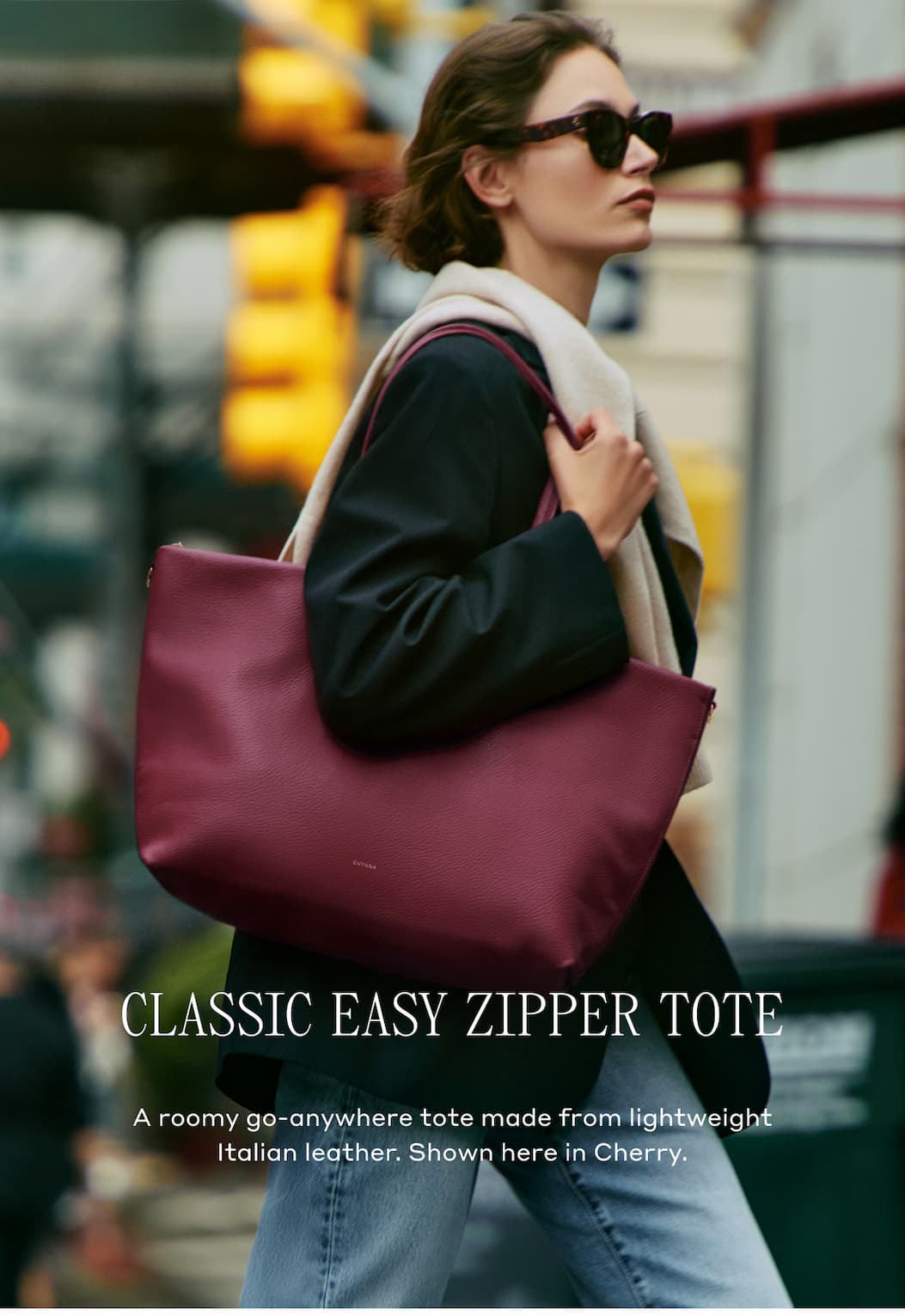 CLASSIC EASY ZIPPER TOTE A roomy go-anywhere tote made from lightweight Italian Leather. Shown here in Cherry.