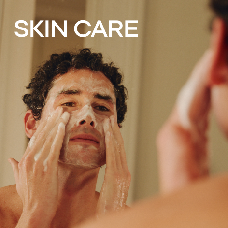 Man washing his face
