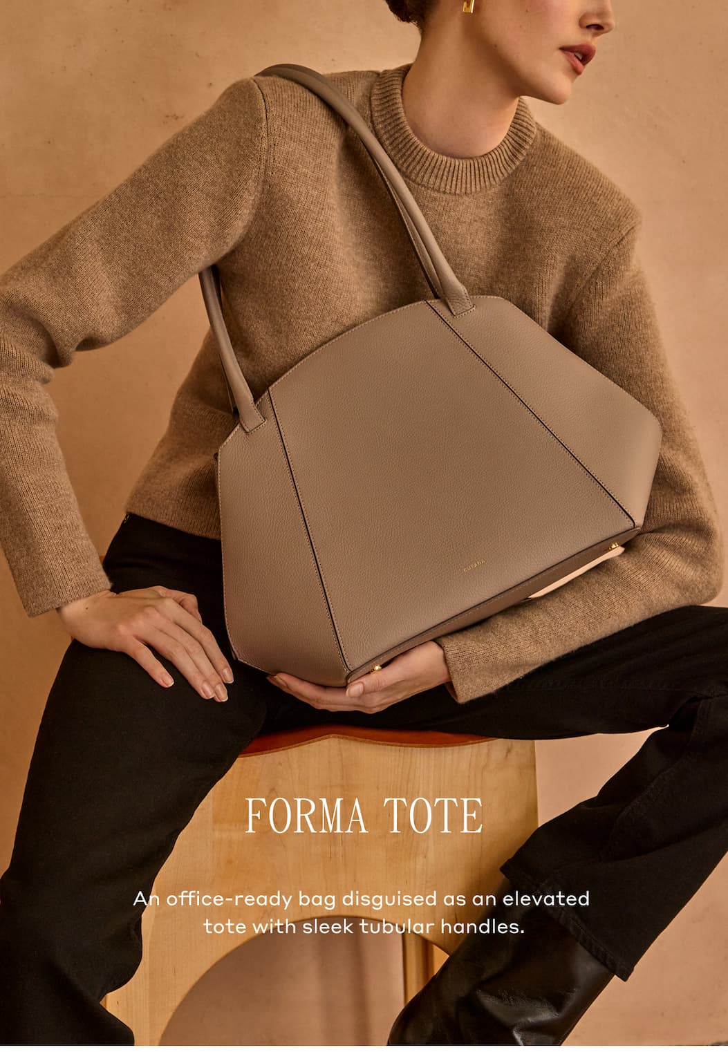 FORMA TOTE An offive-ready bag disguised as an elevated tote with sleek tubular handles.