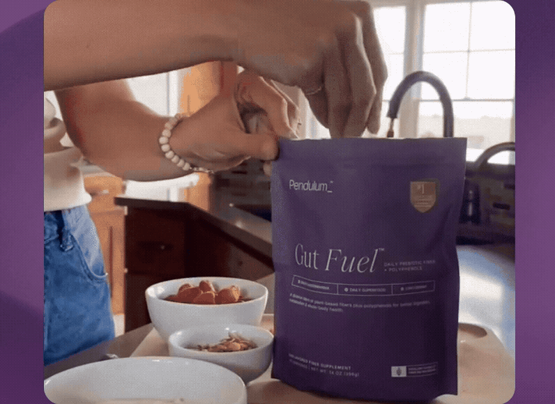 Gif of a scoop of Gut Fuel being added to a bowl.