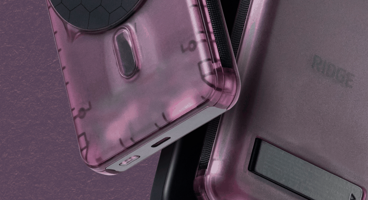 An Atomic Purple power bank snapped to the back of a phone, kickstand out