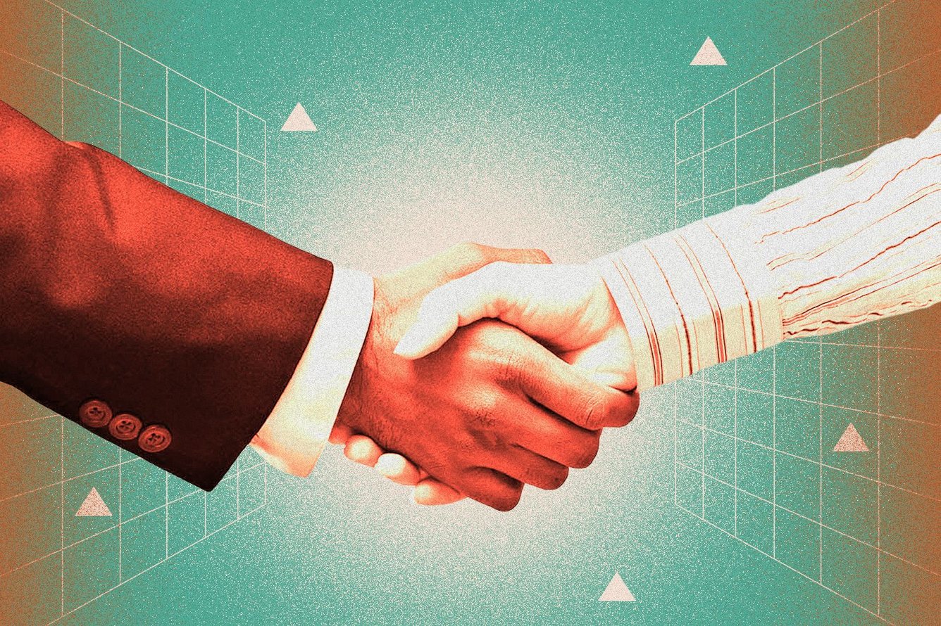 two hands shaking joining forces marketing brew