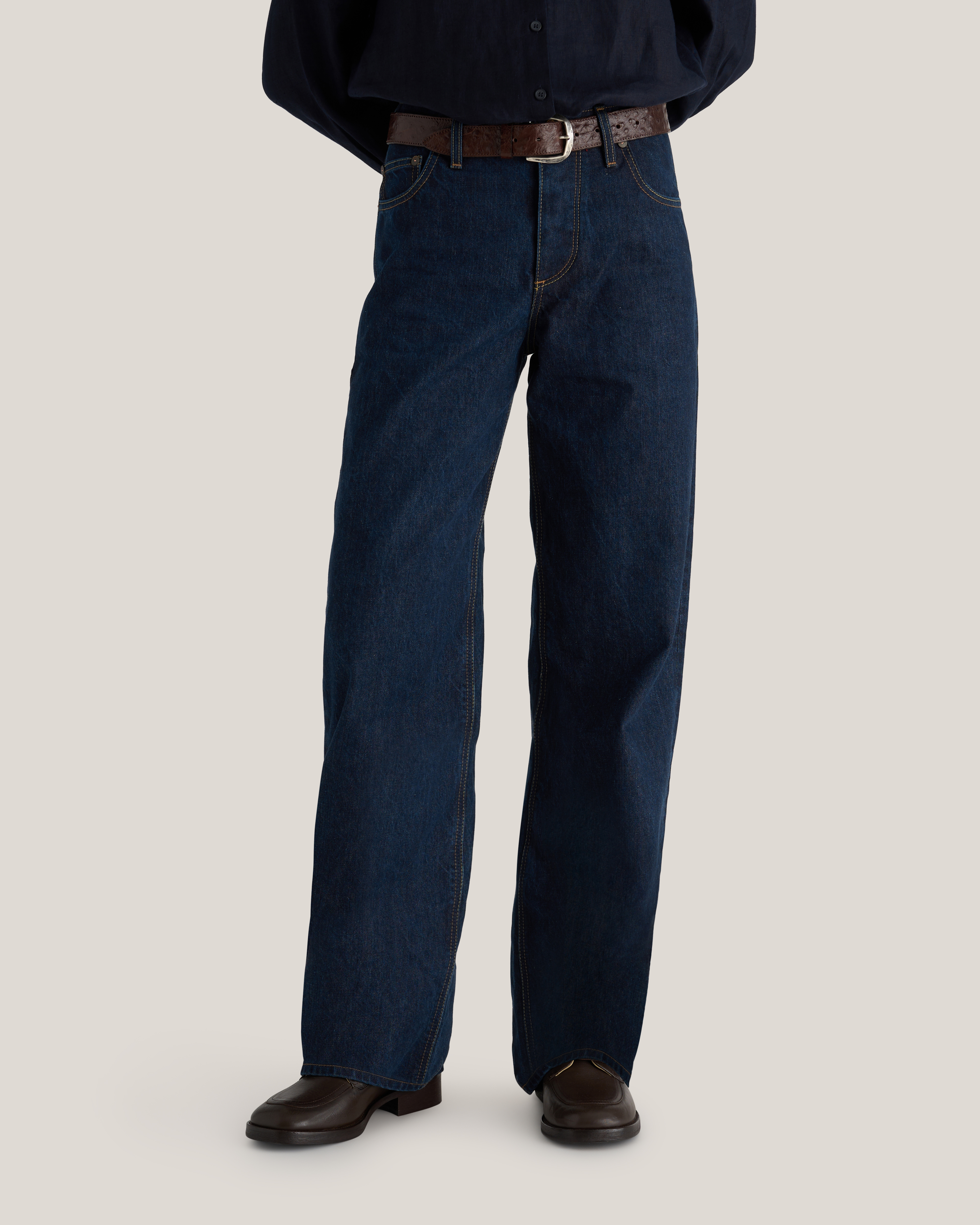 waist down photo of model wearing Edna Rinse Wash Organic denim jean