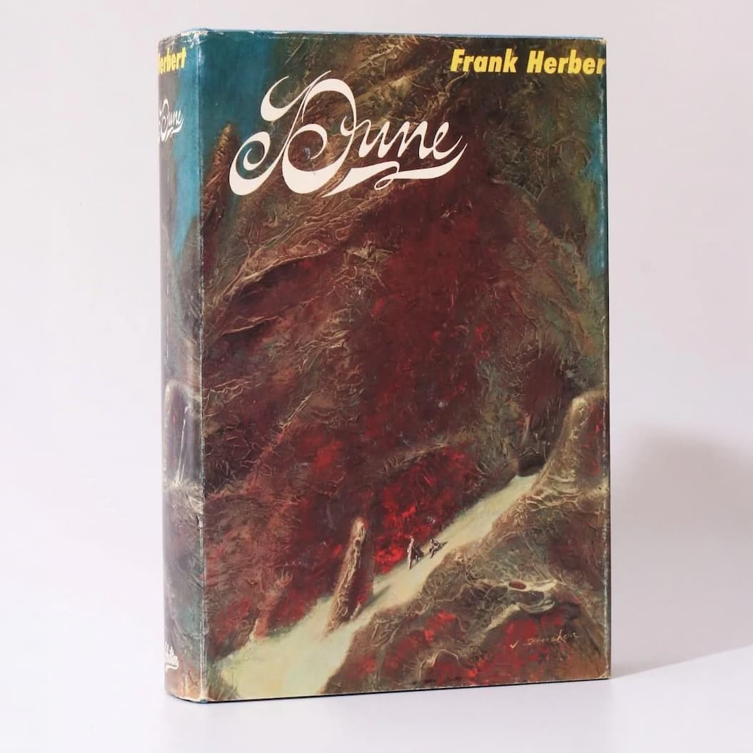 Dune by Frank Herbert, shown upright with its illustrated book cover.