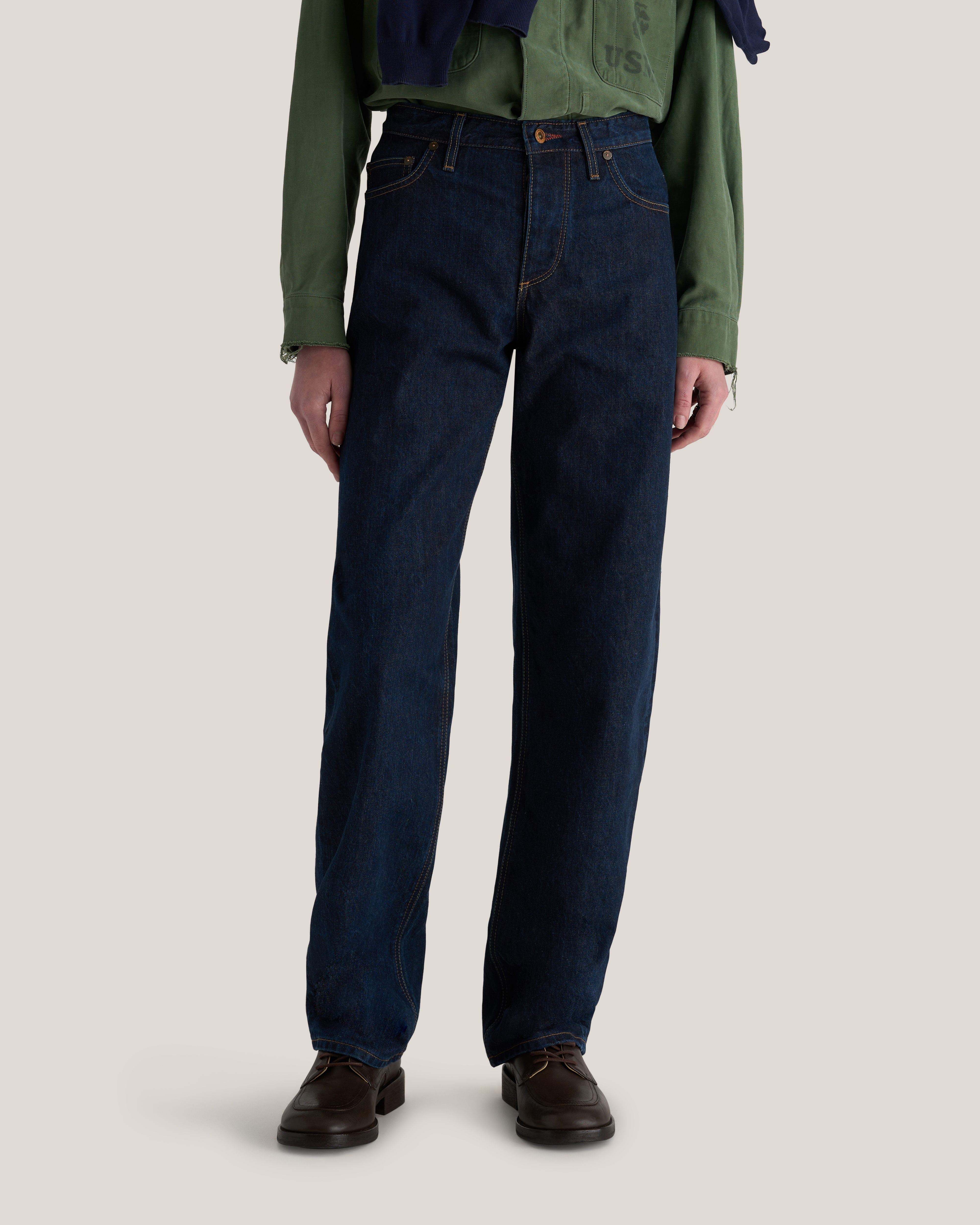 waist down photo of model wearing Astrid Rinse Wash Organic denim jeans
