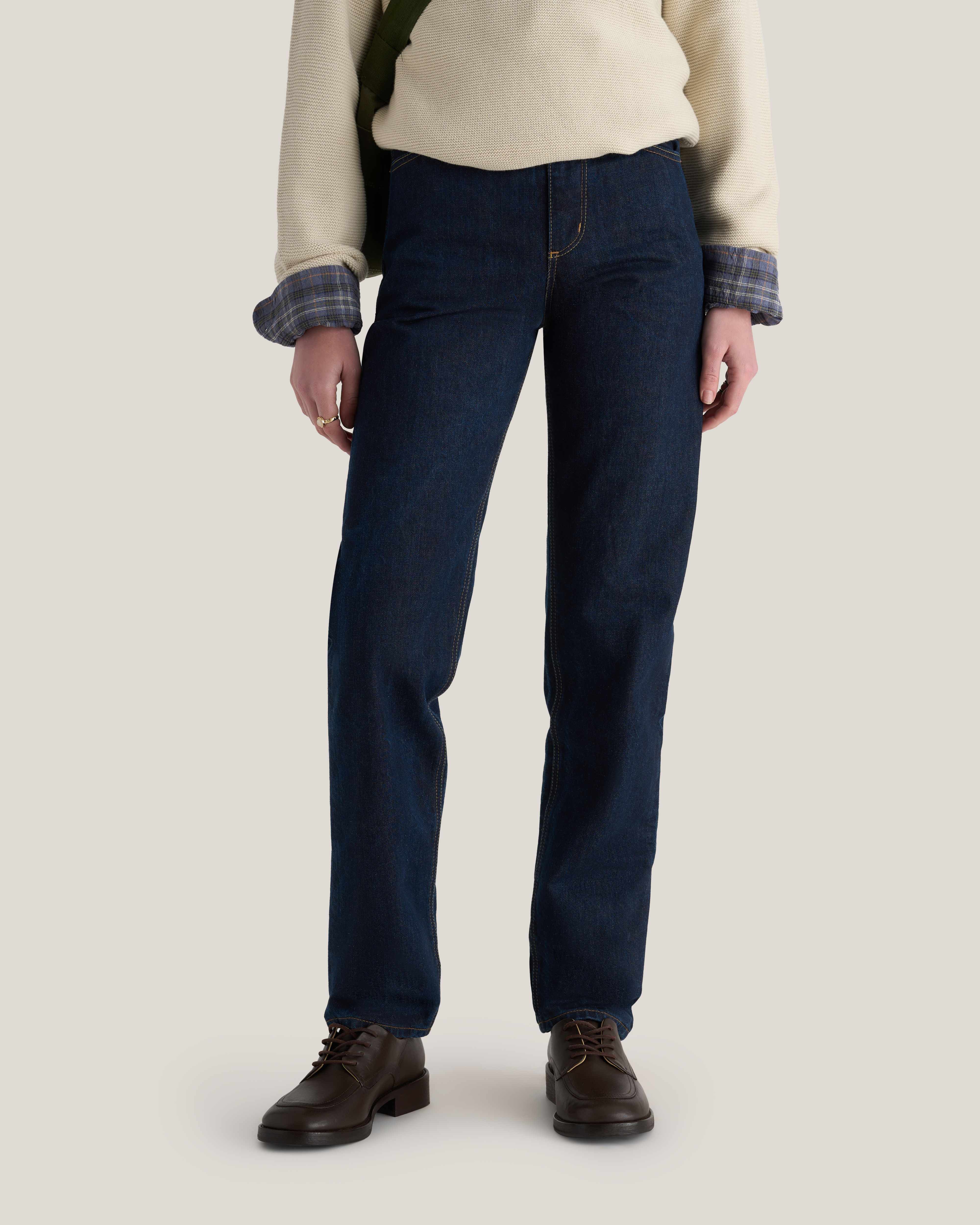 waist down photo of model wearing the Mari Rinse Wash organic denim jean.