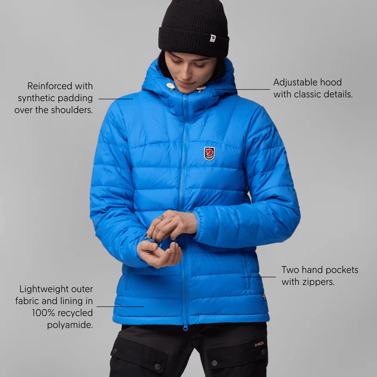 Reinforced with synthetic padding over the shoulders - Adjustable hood with classic details - Lightweight outer fabric and lining in 100% recycled polyamide - Two hand pockets with zippers