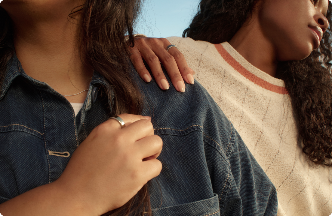 Two people wearing Oura Ring 5