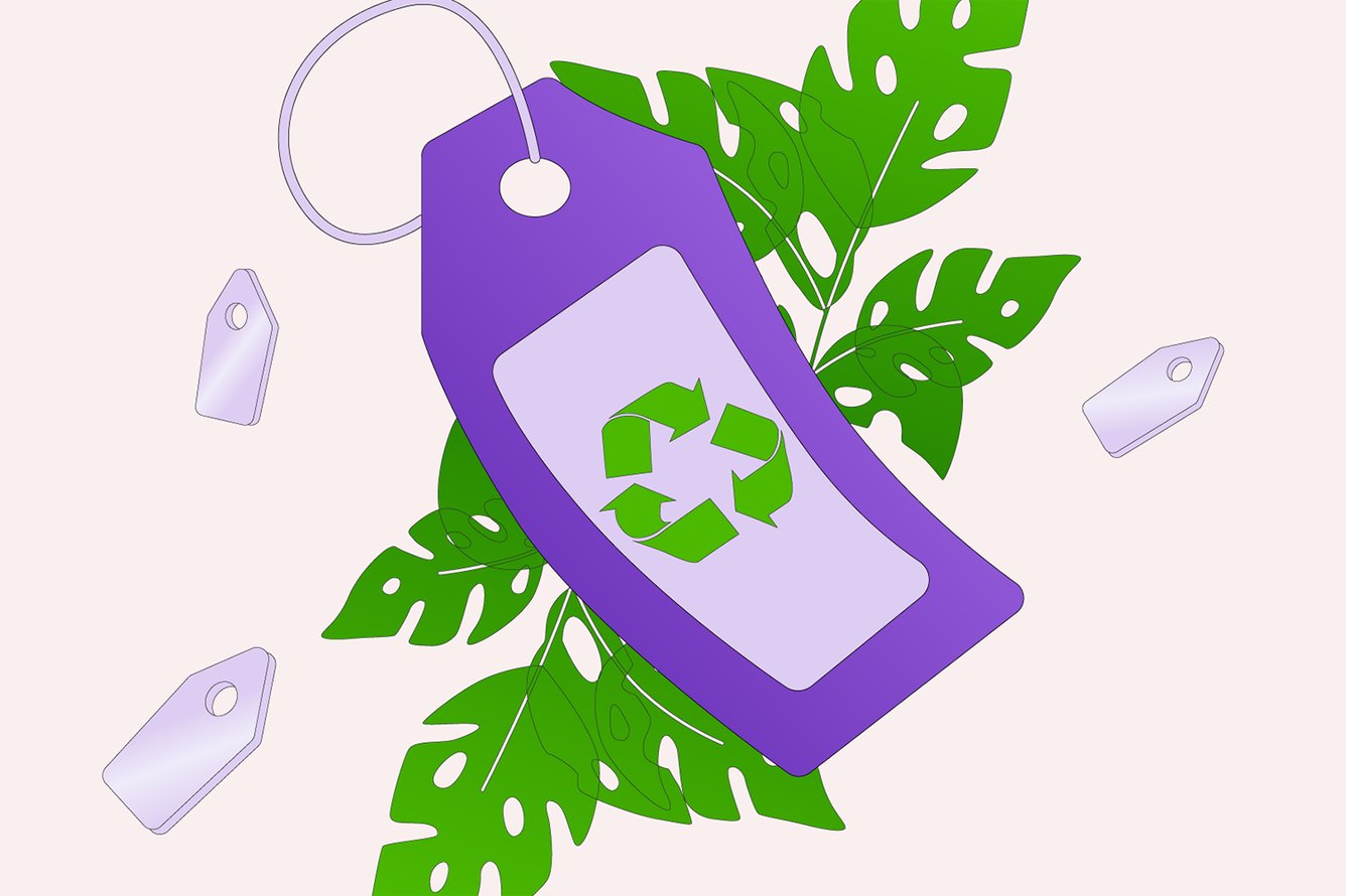 A retail tag featuring a recycle icon surrounded by leaves