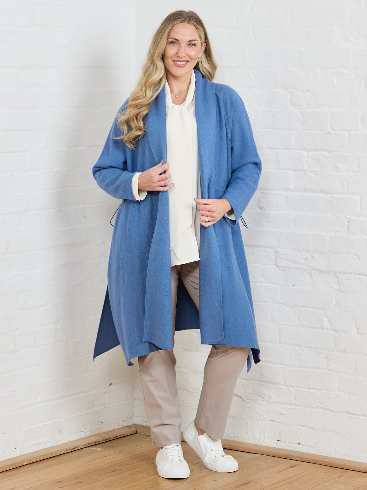 Women wearing blue coat