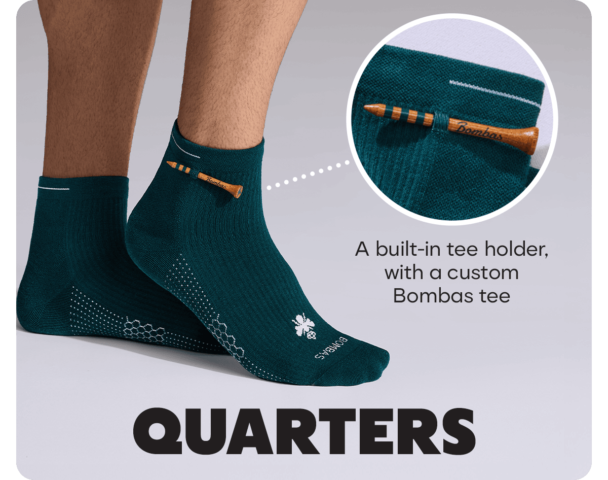 A built-in tee holder, with a custom Bombas tee. QUARTERS